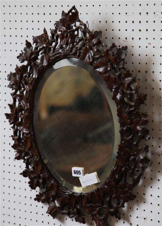 Bavarian carved cedar oval wall mirror